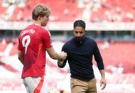 Manchester United head coach Rubem Amorim (right)